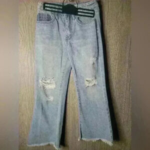 Women's YMI Dream authenic denim distressed jeans with holes. Size 1/25. Ligh